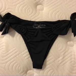 Frankie’s black swim bottoms